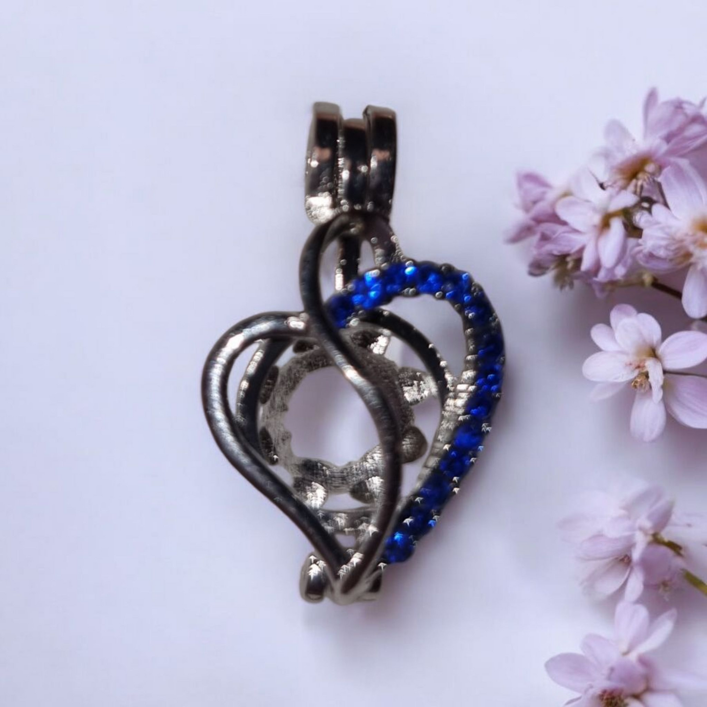 Heart cage with blue stones